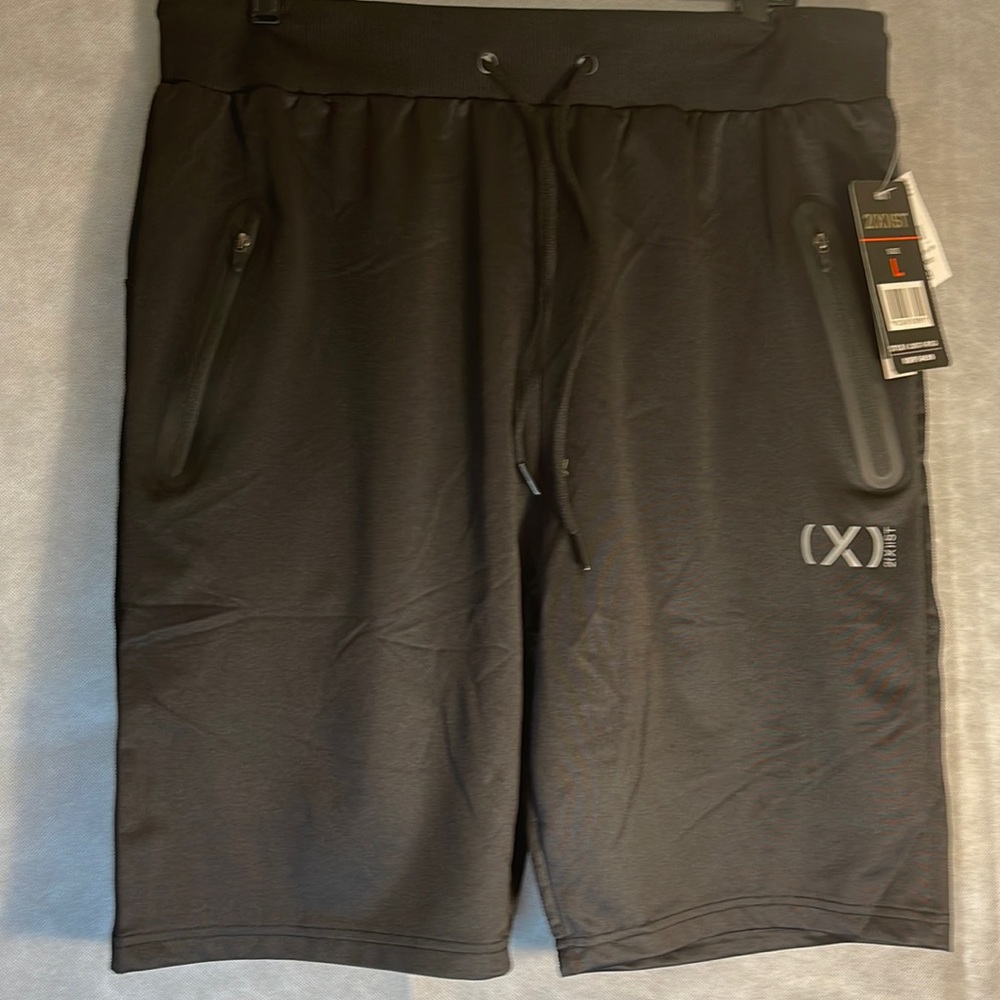 Black active shorts . 90% polyester and 10% spandex.